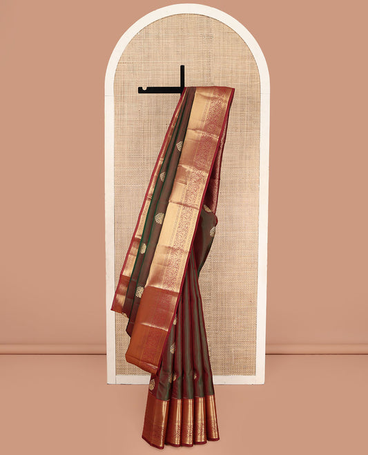 Green Vasundhara Lite Silk Mix Saree, Decorated with Zari Buttas on Its Body, Complemented by a Contrast Border of Rekku, Muthu, Mayil Kann, and Floral Designs, Intricately Designed Pallu, and Paired with a Contrast Blouse