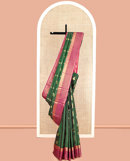 Green Vasundhara Lite Silk Mix Saree, Adorned with Pichwai Cow Buttas, Complemented by a Contrast Border of Rekku, Neli, and Yaanai Designs, Intricate Pallu, and a Contrast Blouse
