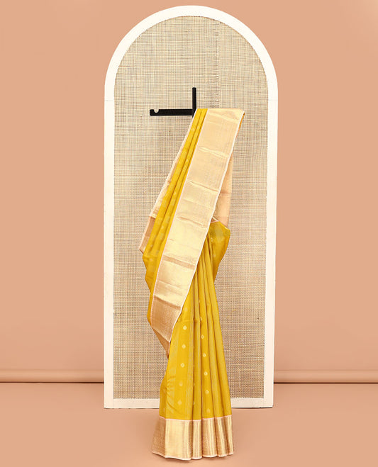 Yellow Vasundhara Lite Silk Mix Saree, Subtly Sparkled with Buttas on Its Body, Complemented by Contrast Border of Traditional Zari Designs, Gleaming Jaal Pallu, and Paired with a Contrast Blouse