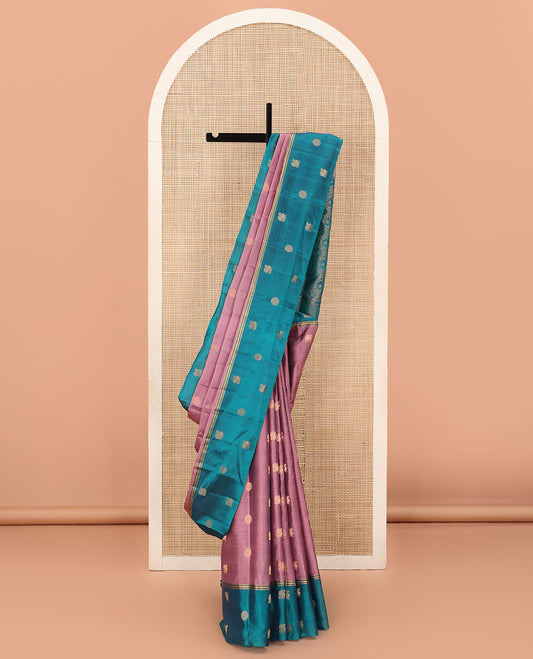 Pink Vasundhara Lite Silk Mix Saree Gracefully Embellished with Annam Chakram Buttas, Decked Up with a Contrast Annam Chakram Border, Pallu Beautified with Rich Zari-Woven Floral Jaal Design, and Comes with a Contrast Blouse
