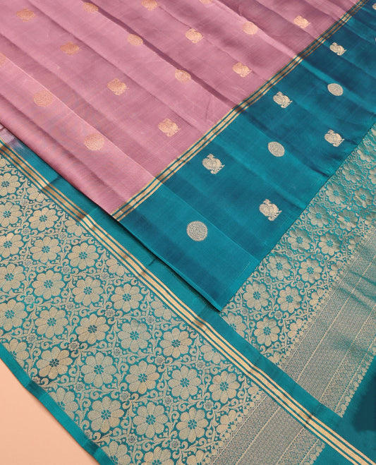 Pink Vasundhara Lite Silk Mix Saree Gracefully Embellished with Annam Chakram Buttas, Decked Up with a Contrast Annam Chakram Border, Pallu Beautified with Rich Zari-Woven Floral Jaal Design, and Comes with a Contrast Blouse