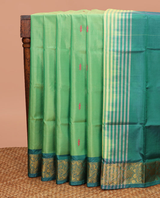 Green Banana Pith Saree, Prettified with Thread Buttas All Over Its Body, Complemented by a Contrast Floral Creeper Design Woven Border, Pallu Steeped with Stripes and Buttas, and Paired with a Contrast Blouse
