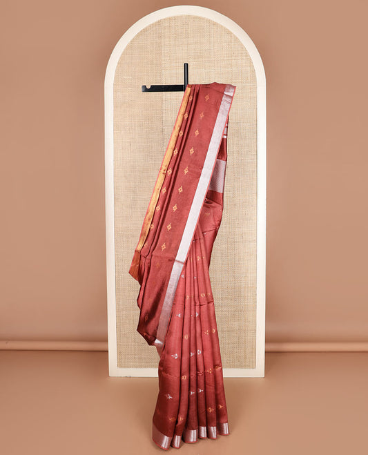 Terracotta red diamond buttas banana pith saree, silver and gold bavanji border, and zari striped pallu