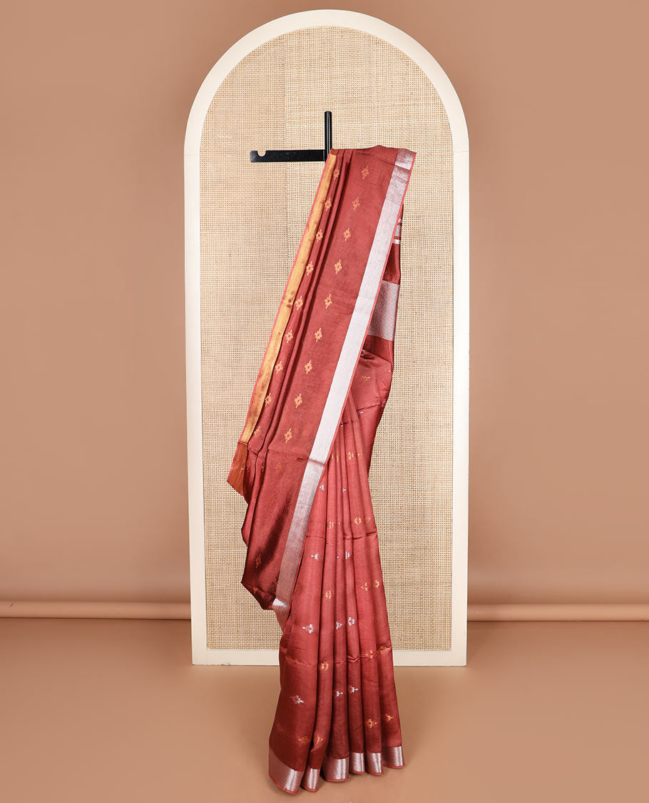Terracotta red diamond buttas banana pith saree, silver and gold bavanji border, and zari striped pallu