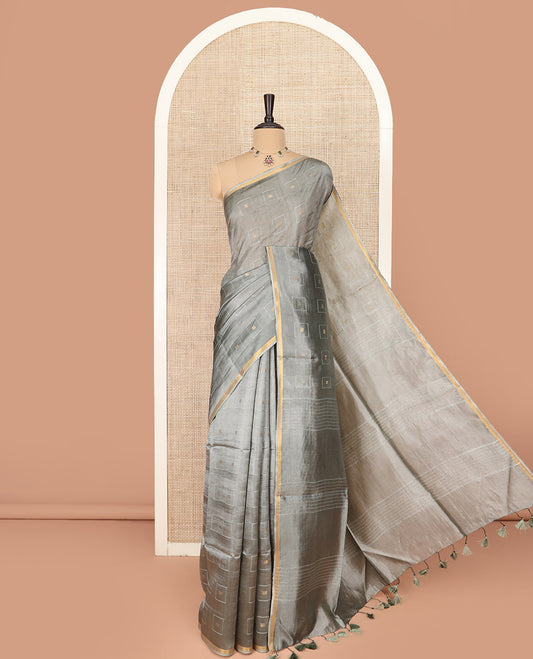 Grey Banana Pith Saree Woven with Zari Buttas Enclosed Squares, Subtly Woven Piping Border, Pallu of Stripes, and Paired with a Matching Plain Blouse