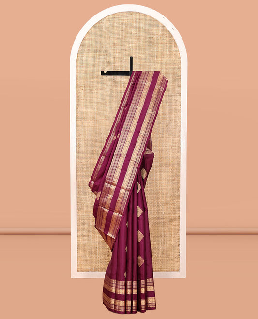 Wine Vasundhara Silk Saree, Woven with Zari Buttas, Highlighted by a Traditional Zari Design Woven Border, Intricate Pallu, and a Matching Blouse