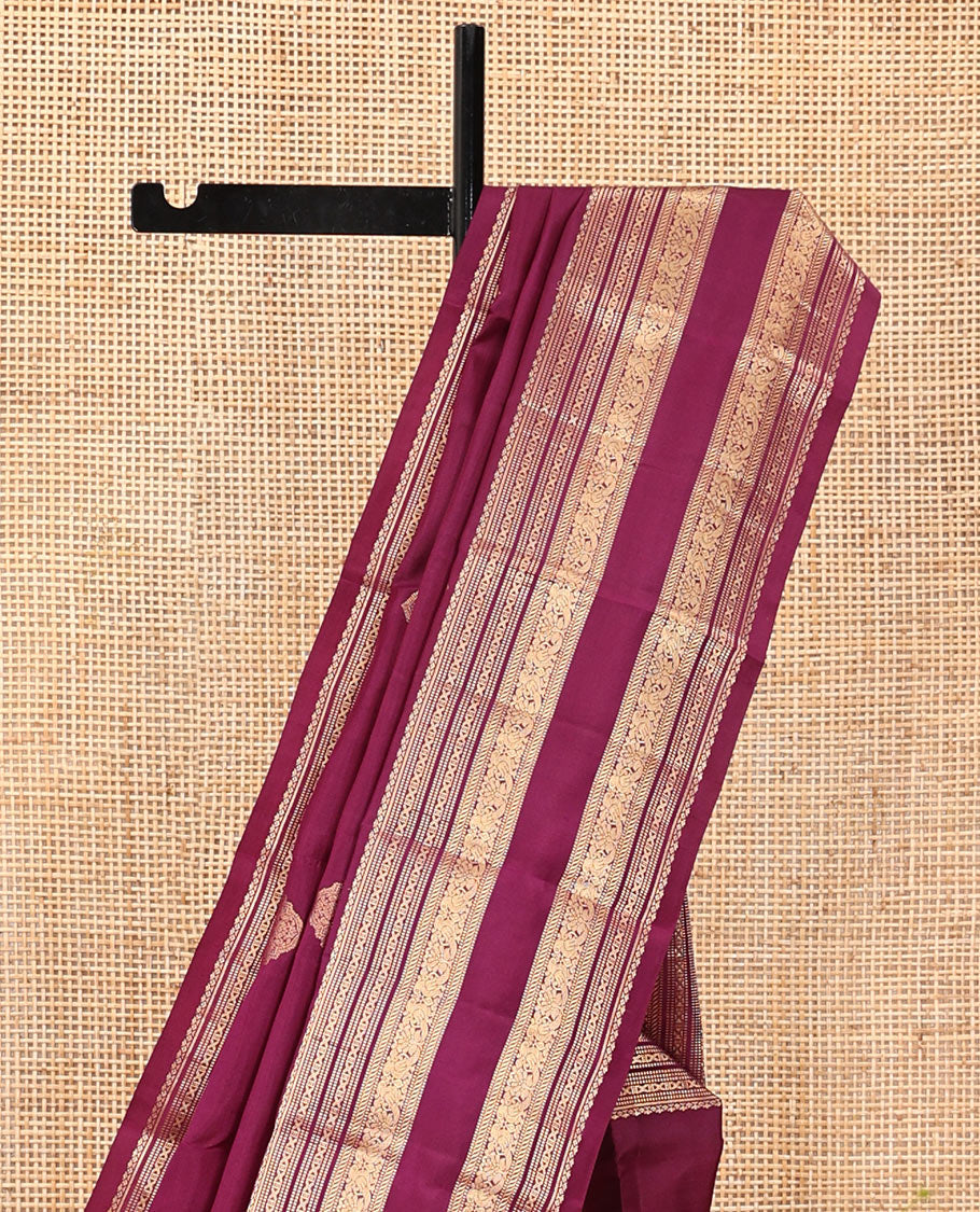 Wine Vasundhara Silk Saree, Woven with Zari Buttas, Highlighted by a Traditional Zari Design Woven Border, Intricate Pallu, and a Matching Blouse