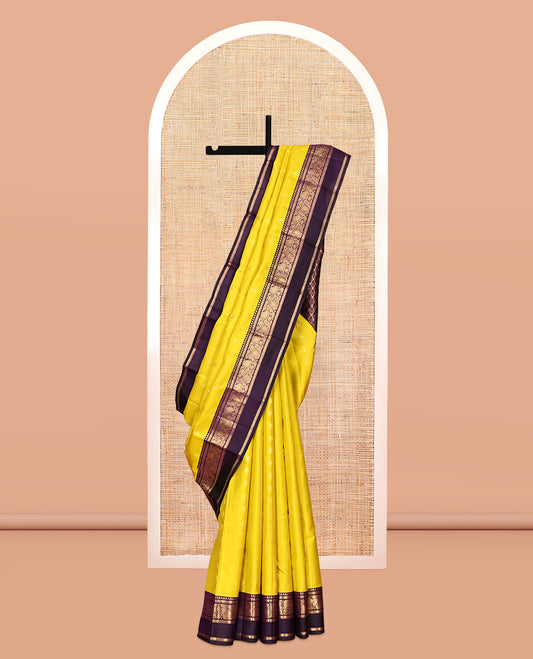 Yellow Vasundhara Silk Saree, Sparsely Woven with Zari Buttas, Contrast Rettai Pettu Border of Rekku, Muthu, Kathir, and Kodi Manga Designs, Intricate Pallu, and Contrast Blouse