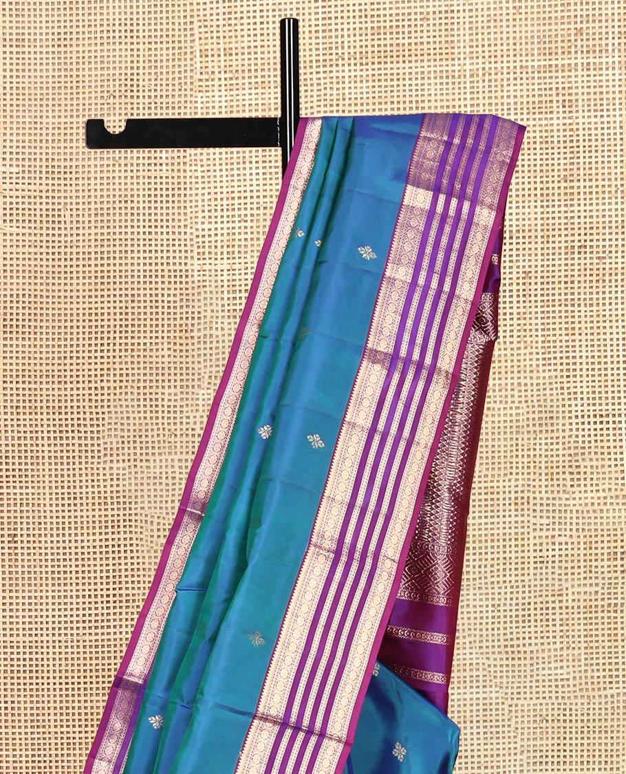 Blue Vasundhara Silk Saree, Enthralled with Zari Buttas, Complemented by a Contrast Border of Rekku, Muthu, Neli, and Chakram Designs, Grand Pallu, and a Contrast Blouse