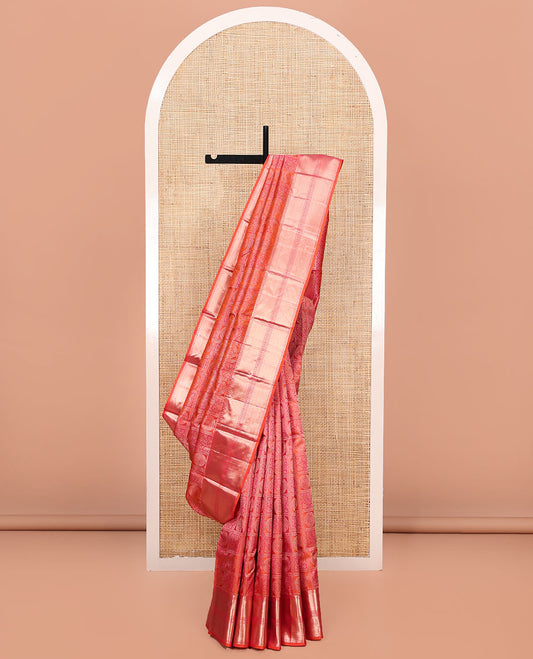 Orange Kanchipuram Wedding Silk Saree, Majestically Detailed with Jacquard Designs on Its Body, Highlighted by a Zari Border of Rekku, Muthu, and Neli Designs, Beautifully Bedecked Pallu, and Paired with a Matching Blouse