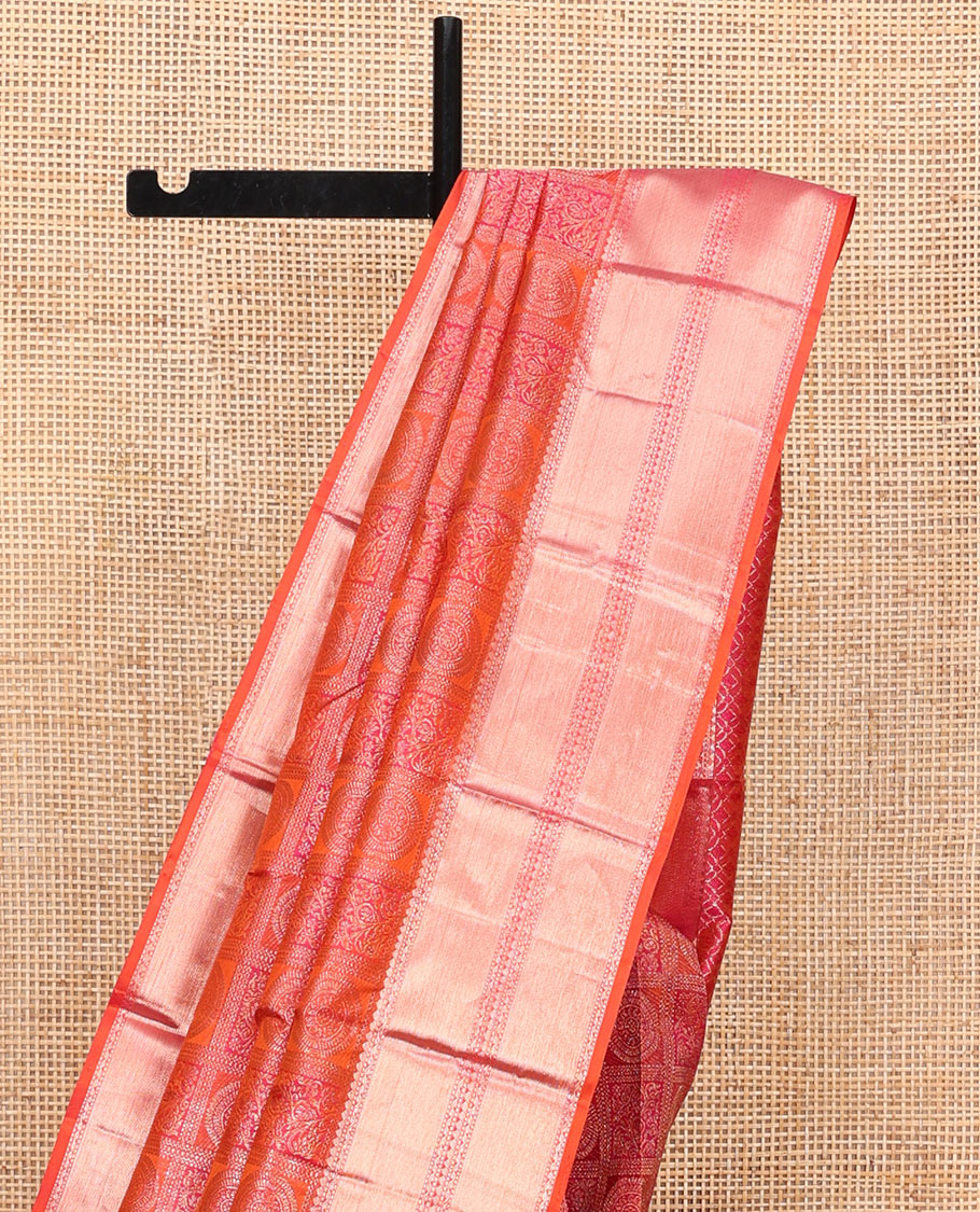 Orange Kanchipuram Wedding Silk Saree, Majestically Detailed with Jacquard Designs on Its Body, Highlighted by a Zari Border of Rekku, Muthu, and Neli Designs, Beautifully Bedecked Pallu, and Paired with a Matching Blouse
