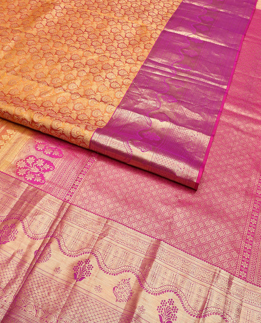 Orange jacquard Kanchipuram wedding silk saree, contrast traditional zari design border, and zari-rich jaal pallu