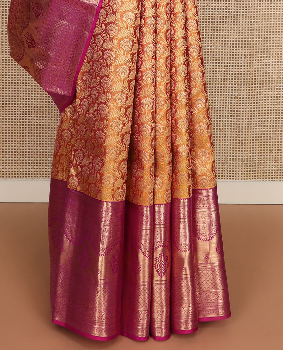 Orange jacquard Kanchipuram wedding silk saree, contrast traditional zari design border, and zari-rich jaal pallu
