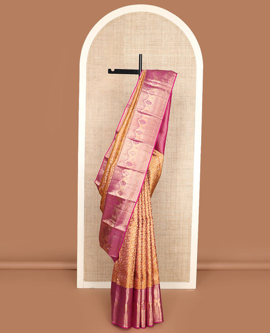Orange jacquard Kanchipuram wedding silk saree, contrast traditional zari design border, and zari-rich jaal pallu