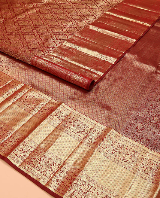 Light maroon jacquard kanchipuram silk saree, zari border of thilakam, muthu, and kodi visiry designs, and jaal pallu