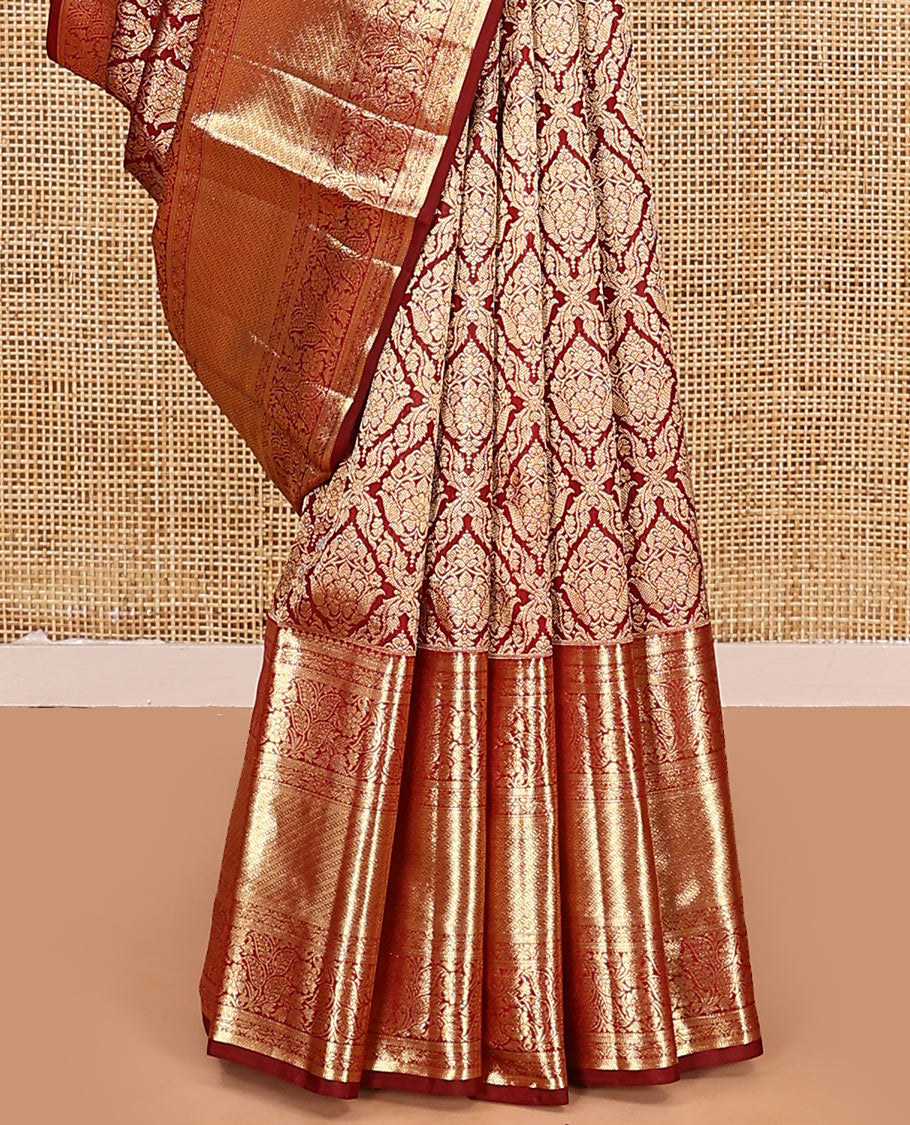 Light maroon jacquard kanchipuram silk saree, zari border of thilakam, muthu, and kodi visiry designs, and jaal pallu