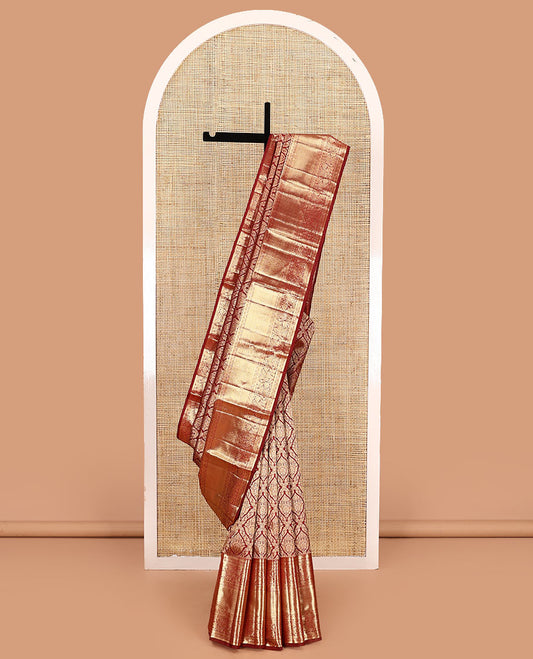 Light maroon jacquard kanchipuram silk saree, zari border of thilakam, muthu, and kodi visiry designs, and jaal pallu