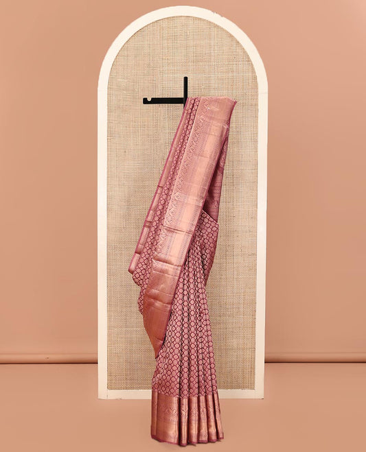 Rosewood Pink Kanchipuram Wedding Silk Saree, Artfully Detailed with Jacquard on Its Body, Highlighted by a Zari Border of Thilakam, Kamalam, Round Mayil, and Yaanai Designs, Opulently Embellished Pallu, and Paired with a Matching Blouse