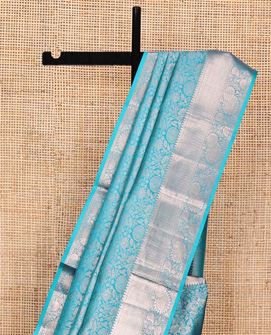 Blue Kanchipuram Wedding Silk Saree, Finely Crafted with Jacquard Design on Its Body, Highlighted by Zari Border of Thilakam, Vanki, and Kodi Visiry Designs, Grand Pallu, and Paired with a Matching Blouse