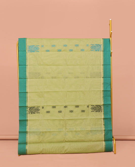 Green Kanchi Cotton Saree, Woven with Buttas All Over Its Body, Complemented by Contrast Border, Jaal-patterned Pallu, and Paired with a Matching Blouse