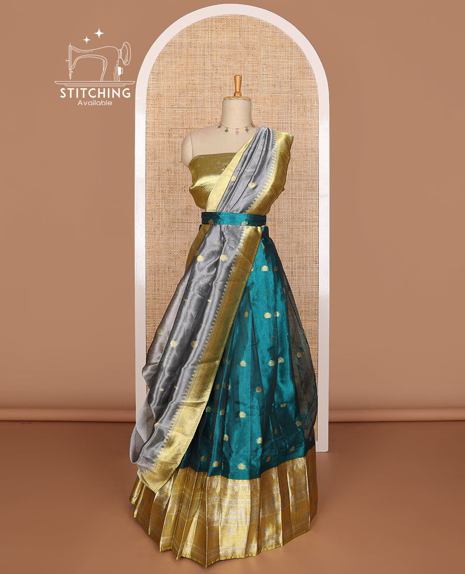 Blue floral buttas tissue half saree with contrast zari design border, jaal zari design blouse & floral design dhavani