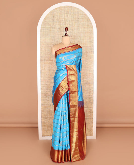 Light blue zari buttas and checked budget silk saree, contrast traditional zari woven border, and jaal pallu