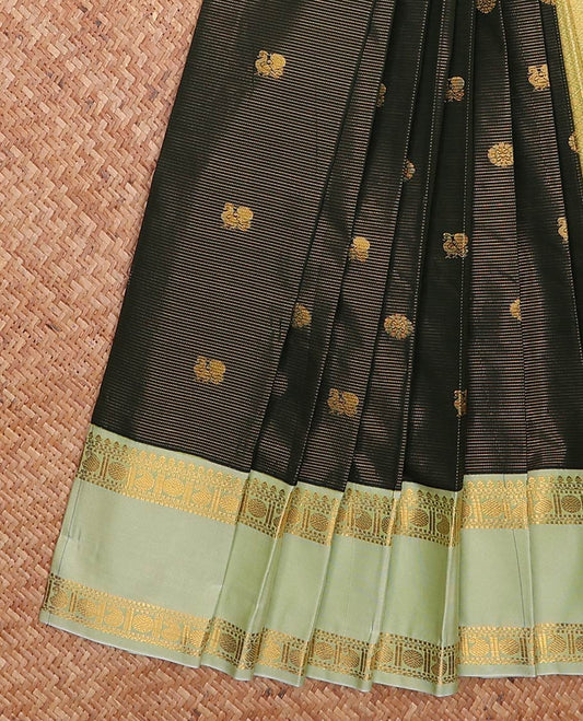 Green zari buttas and striped gift saree, contrast traditional zari rettai pettu design border, and intricate pallu