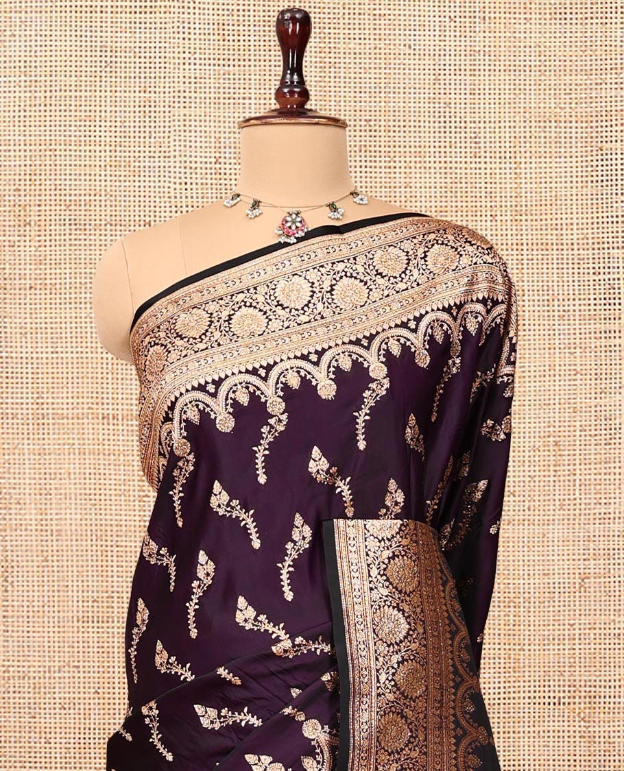 Dark Purple Banarasi Satin Saree, Beautified with Floral Buttas, a Floral Creeper Border, Intricate Stonework Pallu, and a Matching Blouse