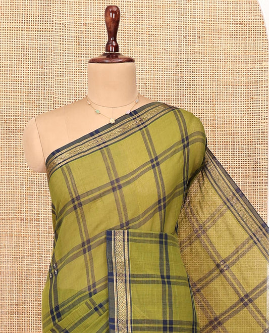 Green Andhra Cotton Saree, Enriched with Checked Design All Over Its Body, Subtly Sparked with a Traditional-Patterned Border, Contrast Pallu of Stripes and Ikkt Floral Buttas, and Paired with a Matching Blouse