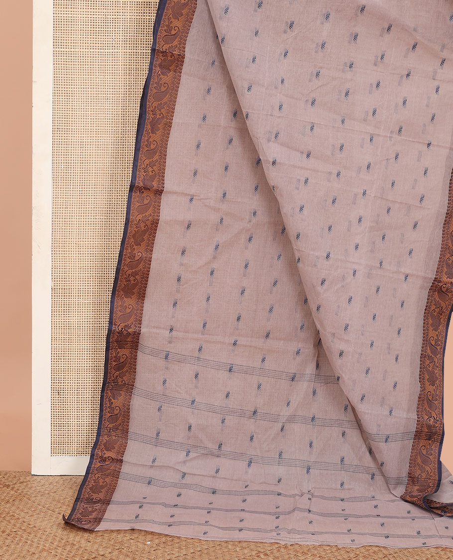 Pale Brown Bengal Cotton Saree, Decked up with Buttas All Over Its Body, Complemented by a Contrast Paisley Design Border, and Pallu Steeped with Stripes