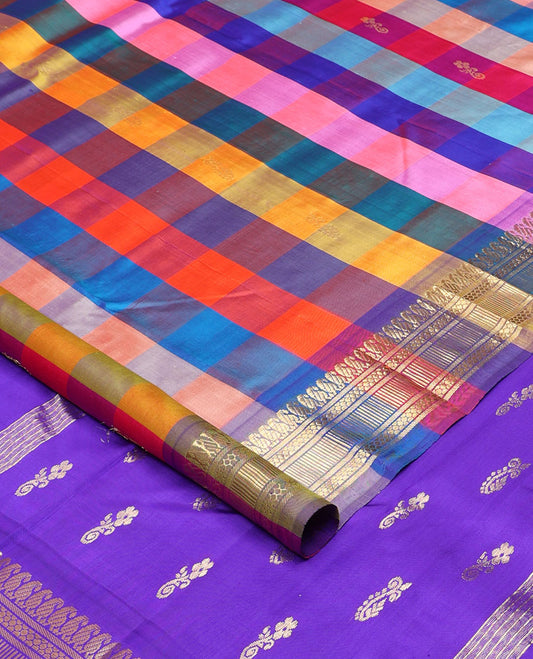 Multi-color paalum pazhamum style checked and zari buttas Kanchipuram silk saree, one-sided border of manga mokku, and then kuli kann designs, and contrast zari woven pallu