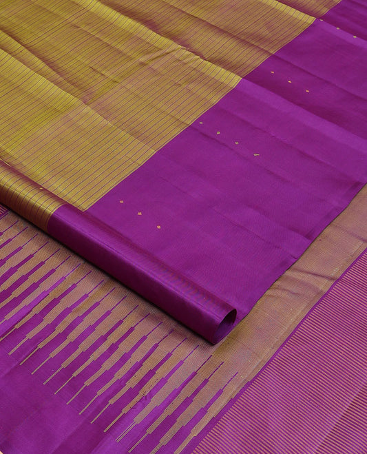 Green striped Kanchipuram silksaree, contrast border of thazampoo rekku & buttas & pallu of seppu rekku designs