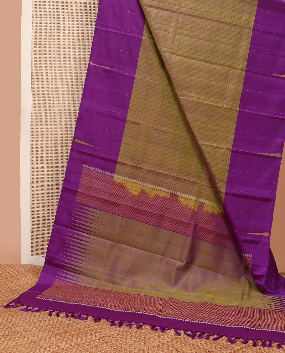 Green striped Kanchipuram silksaree, contrast border of thazampoo rekku & buttas & pallu of seppu rekku designs