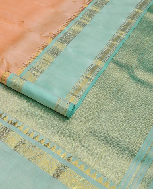 Light orange zari buttas Kanchipuram silk saree, contrast thazampoo rekku border of thilakam mokku,banaras,diamond, and kodi visiry designs and jaal pallu