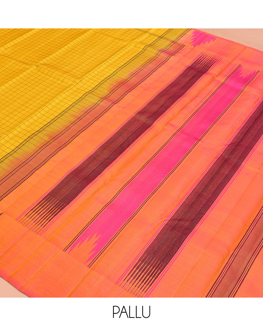 Yellow checked Kanchipuram silk saree, thazampoo rekku border, and pallu of pillaiyar mokku, and seppu rekku designs