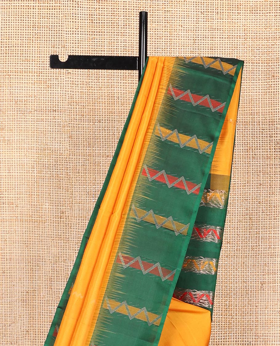 Yellow zari buttas soft silk saree, contrast border, and pallu of chevron stripes