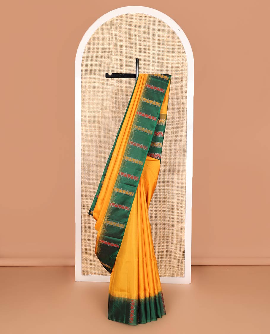Yellow zari buttas soft silk saree, contrast border, and pallu of chevron stripes