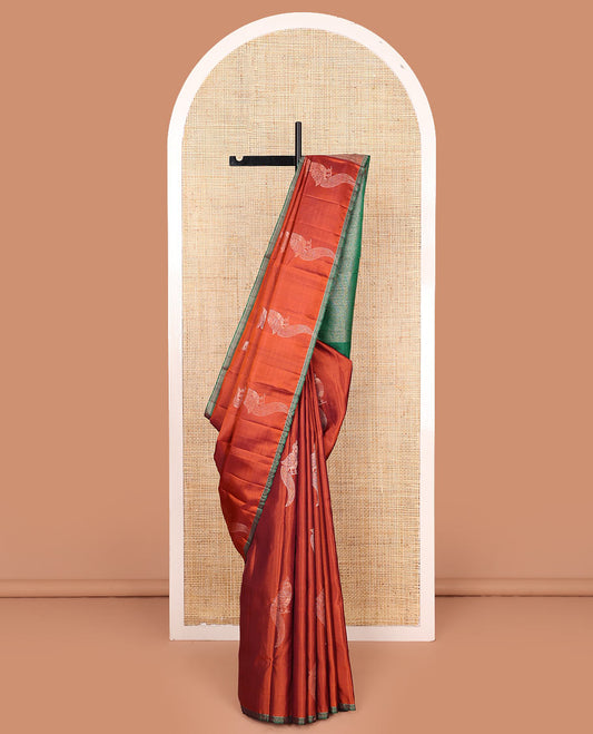 Orange mayil buttas soft silk saree, contrast piping border, and pallu of muthu, and banaras designs