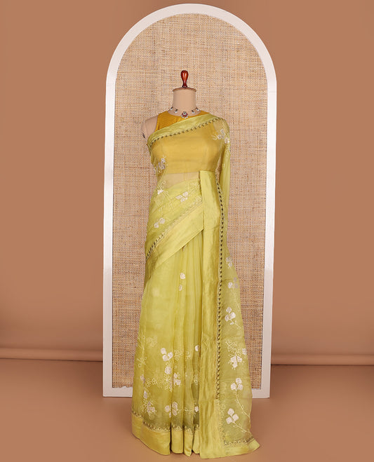 Green floral vine embroidered organza designer saree, satin embroidered border