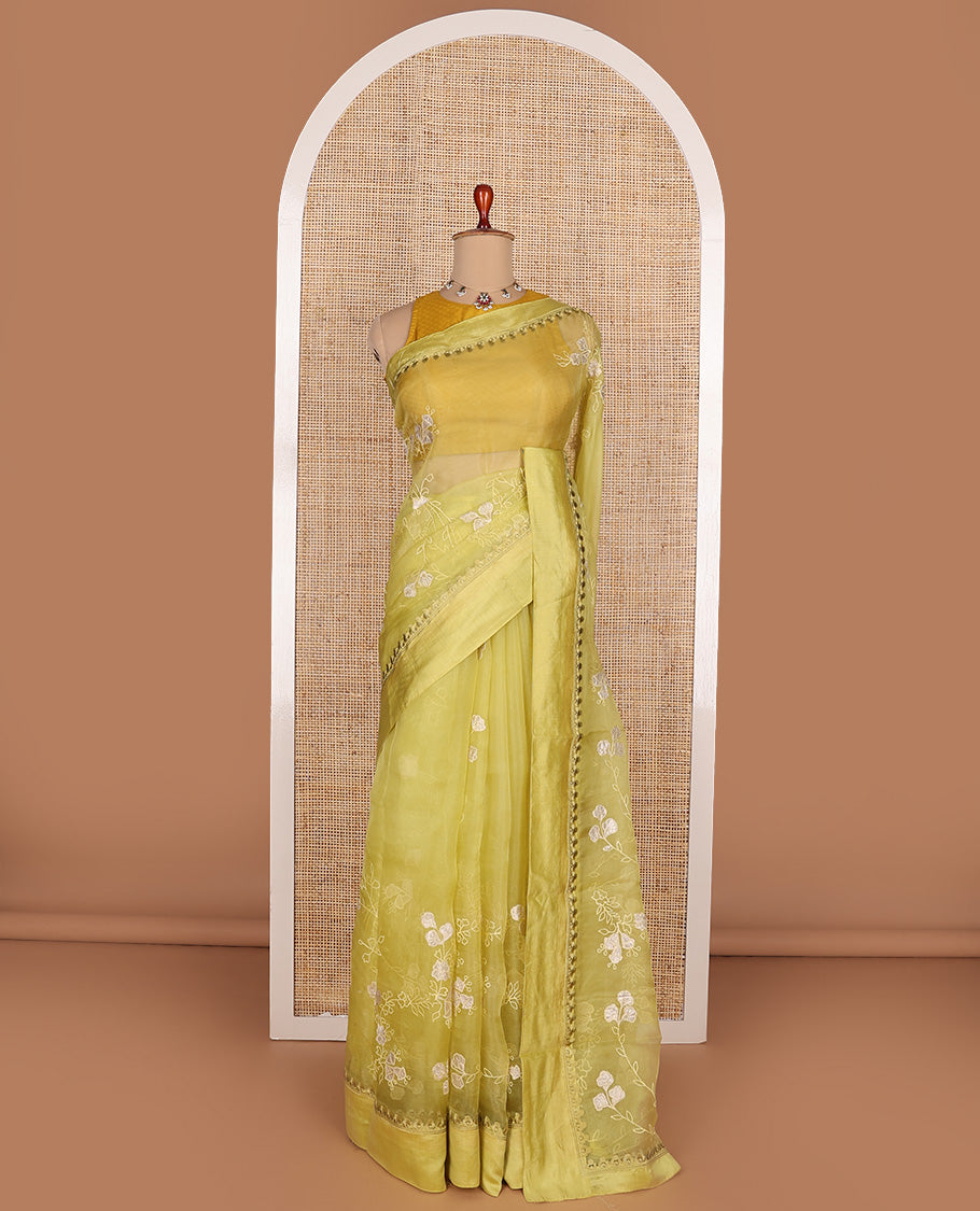Green floral vine embroidered organza designer saree, satin embroidered border
