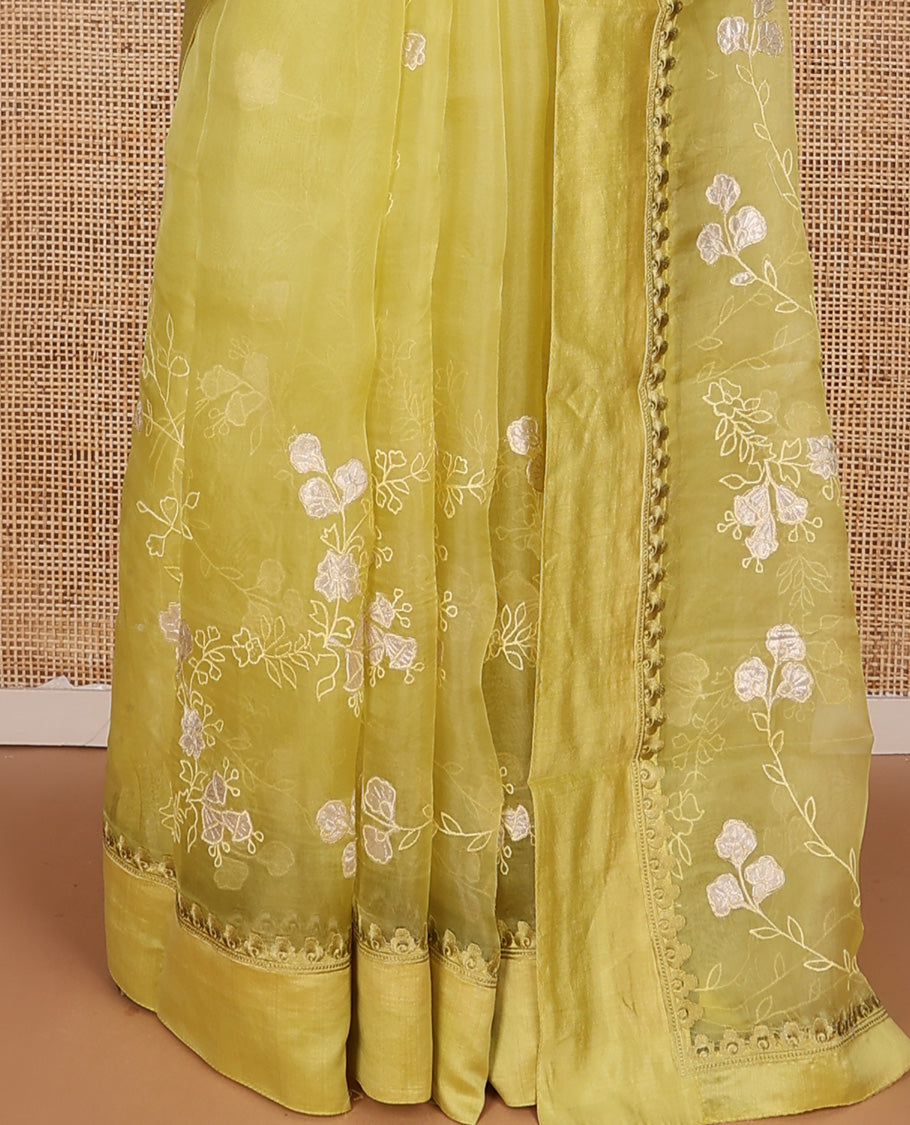 Green floral vine embroidered organza designer saree, satin embroidered border