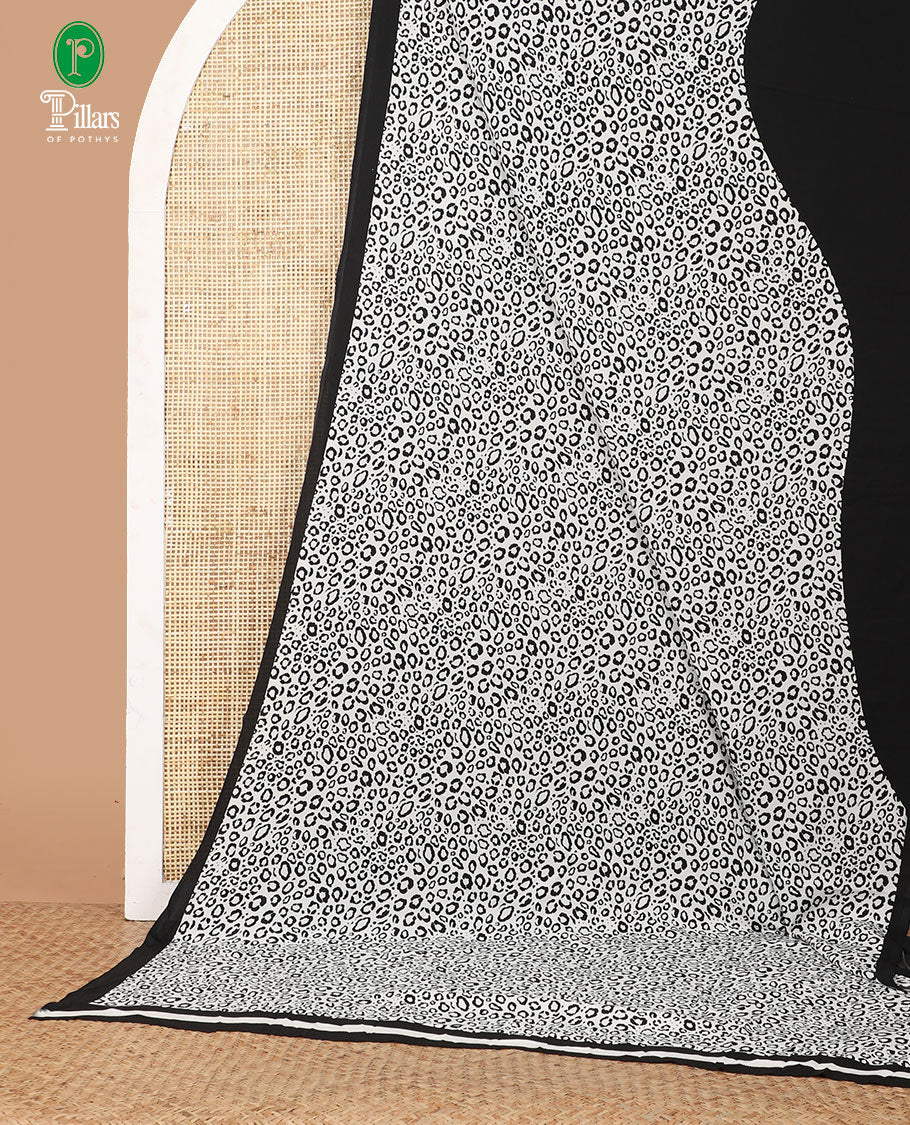 White leopard-skin-style animal printed crepe saree with contrast black plain border