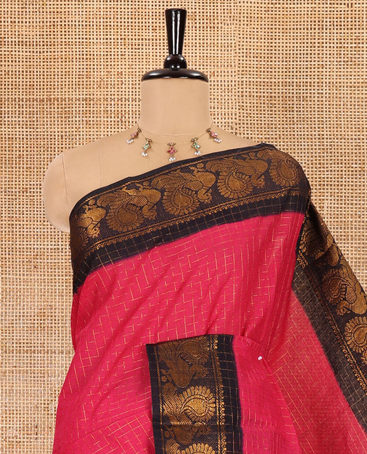 Rani pink checked sungudi cotton saree, contrast peacock motifs zari border, zari striped pallu, and a contrast zari design blouse