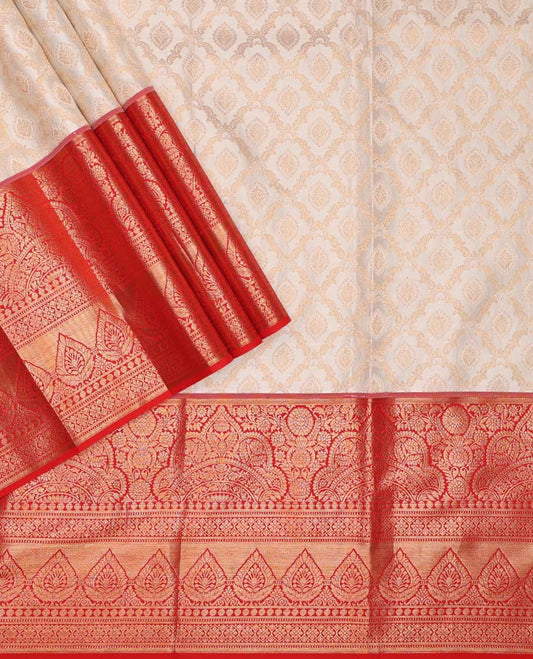 Cream pure silk half-saree,  jacquard skirt, contrast traditional zari border, matching zari blouse, and zari design dhavani