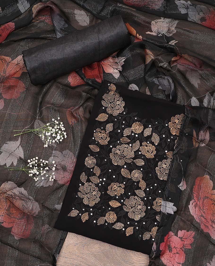 Black material chudidar set, neck rose motifs thread embroidered top, plain bottom, and floral printed dupatta