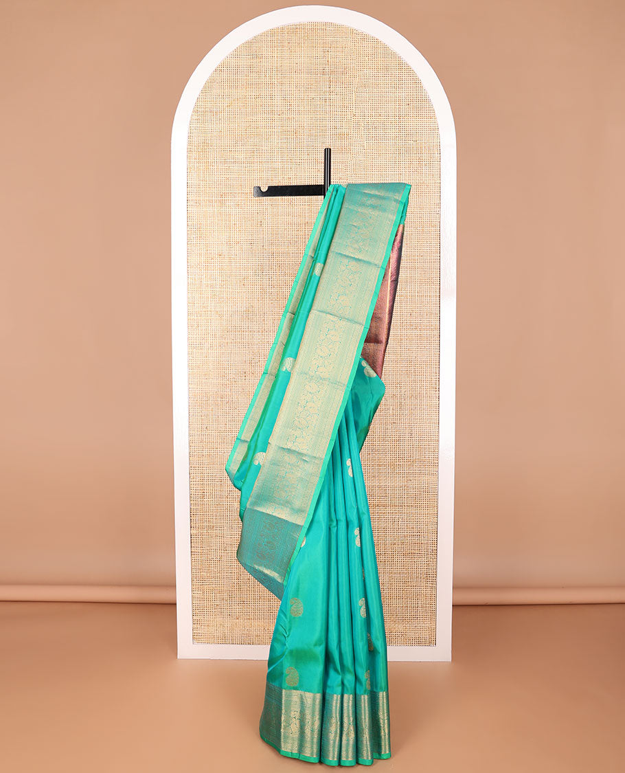 Sea blue manga design vasundhara elite silk saree with contrast intricate zari design border & checked floral design pallu