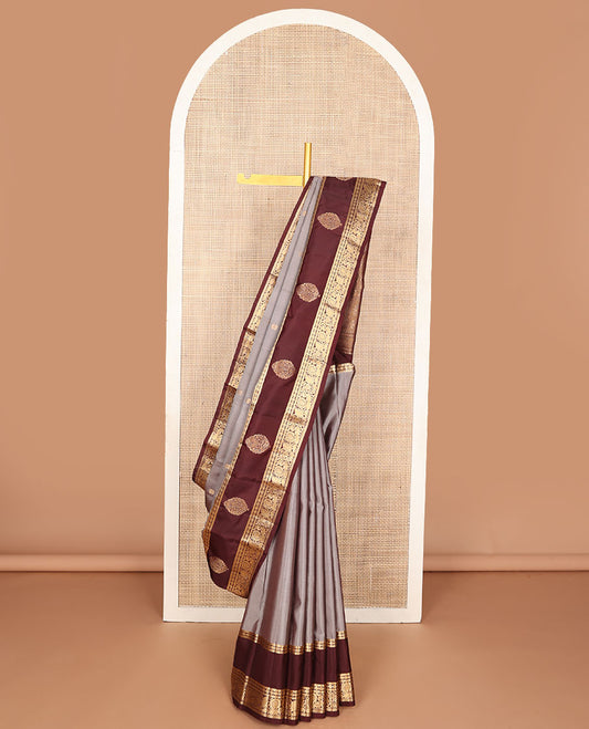 Grey zari buttas silk saree, contrast border of muthu,banaras,rudraksham design & mayil & pallu of rudraksham motifs