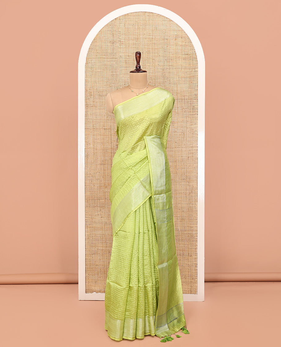 Green Banana Pith Saree, Sparsely Woven with Stripes All Over Its Body, Subtle Self-Border of Jaal Designs, Pallu Steeped with Stripes, and Paired with a Matching Blouse