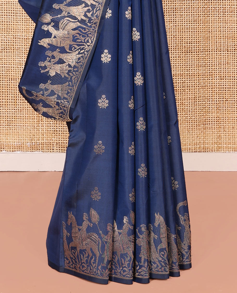 Blue Vasundhara Silk Saree Gleamed Up with Zari Buttas  All Over Its Body, Highlighted by a Zari Border of Wedding-Themed Bridegroom Designs, Pallu Majestically Detailed with Jaal Designs, and Paired with a Matching Blouse