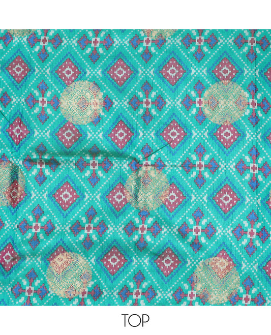 Turquoise material chudidhar,intricate print & butta patola silk top,contrast printed bottom & intricate dupatta